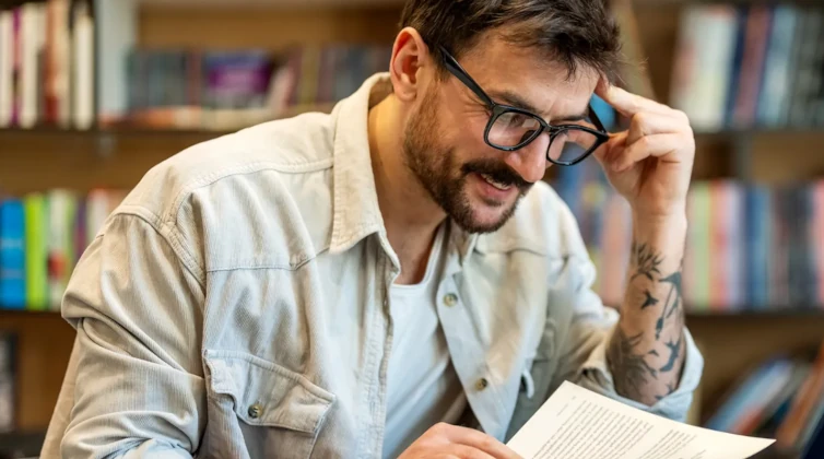 Man looking at a book