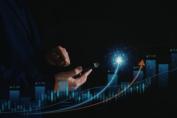 Data science professional looking at mobile phone