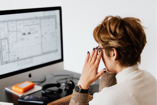 intelligence professional reviewing data on computer