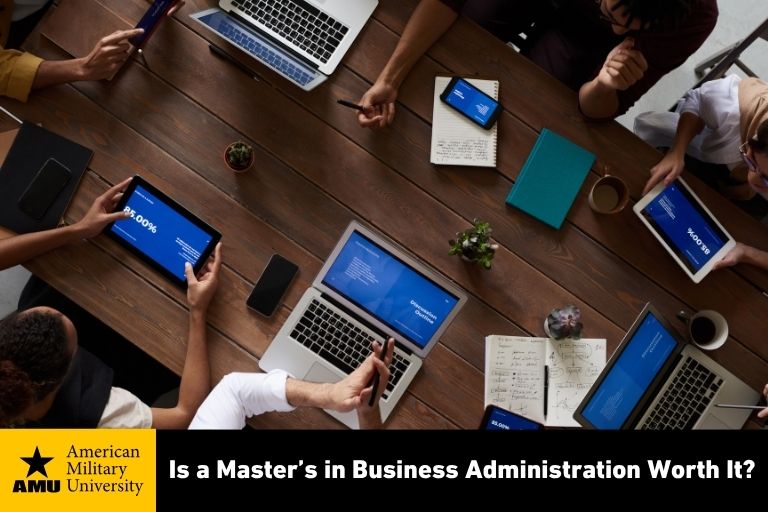 is-a-masters-in-business-administration-worth-it business administration team working on laptops and tablets