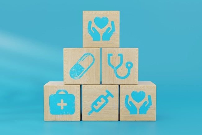 public health icons on wooden blocks