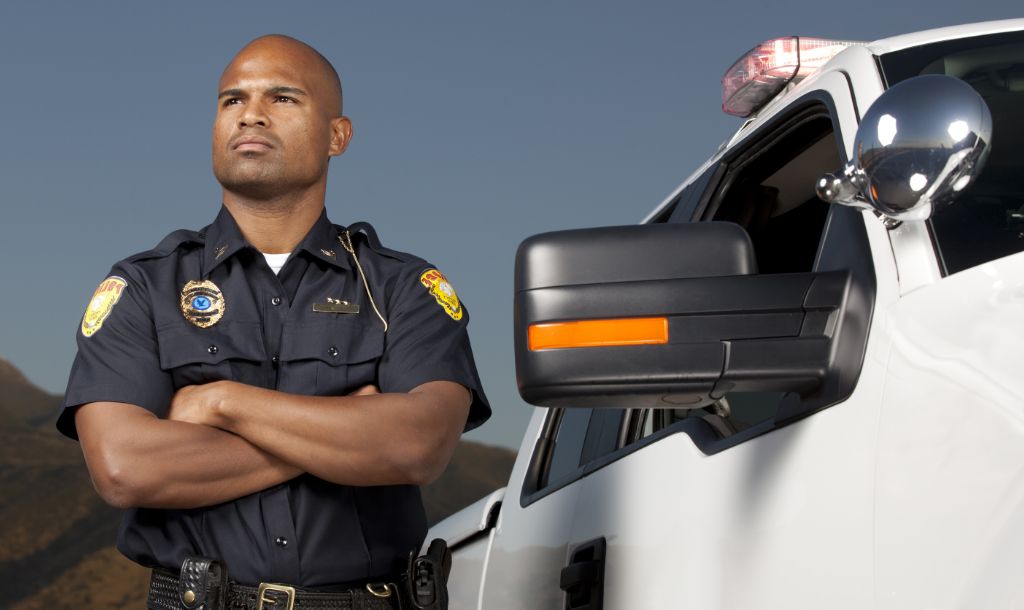 homeland security office with arms crossed